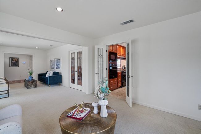 Living area has direct access to the kitchen | Image 12