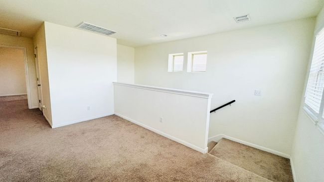 Unfurnished room with carpet flooring and baseboards | Image 27