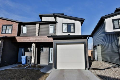 7 - 414 Highlands Boulevard W, Home with 2 bedrooms, 2 bathrooms and 2 parking in Lethbridge AB | Card Image
