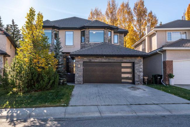75 Hamptons Close Nw, Home with 5 bedrooms, 3 bathrooms and 4 parking in Calgary AB | Image 1