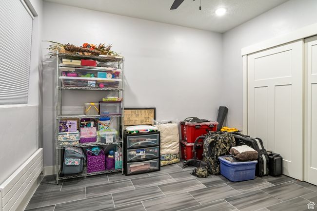 Storage featuring ceiling fan | Image 83
