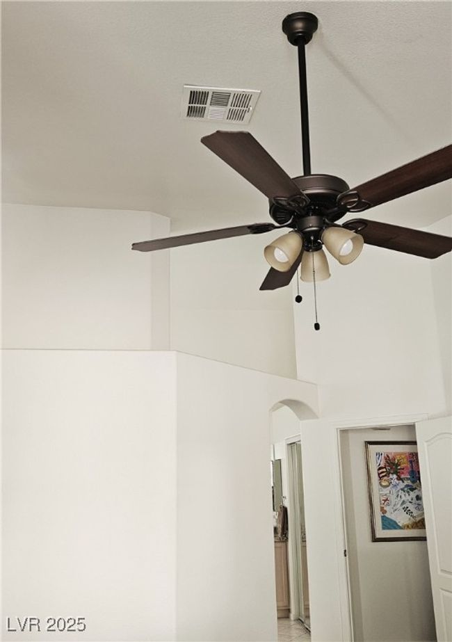 Detailed view of ceiling fan and arched walkways | Image 26
