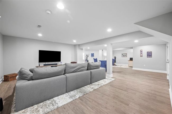 Wow. You will just love this downstairs game room. There is so much space for all your needs. | Image 38