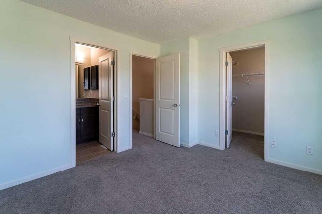 144 Sunvalley Road, Townhouse with 3 bedrooms, 4 bathrooms and 2 parking in Cochrane AB | Image 24