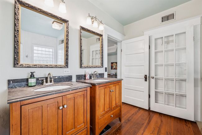 Bathroom featuring vanity and wood finished floors | Image 30