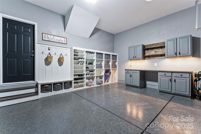 Fully finished garage with epoxy floor and Look at that storage!! | Image 18