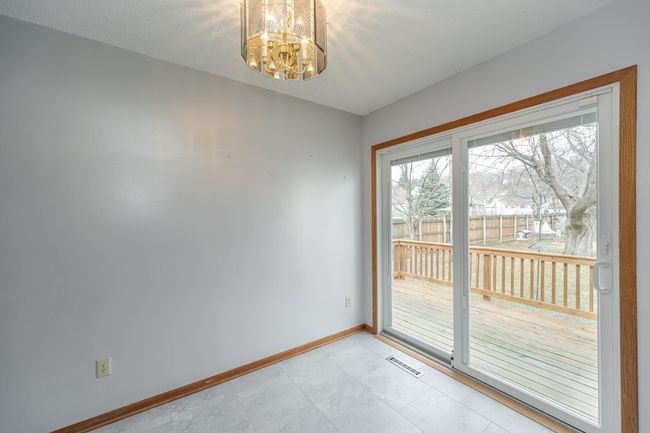 Dining area out to the deck. | Image 8