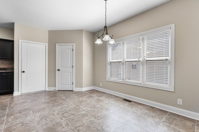 Large Eat In Area with Lots of Natural Lighting! | Image 9