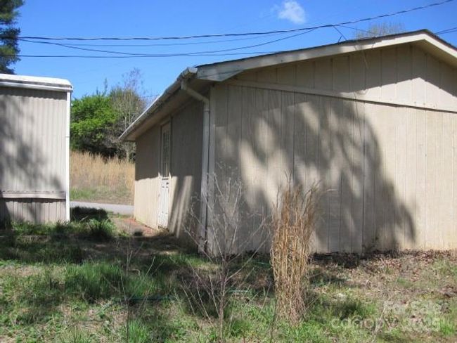 Back of home and garage | Image 6