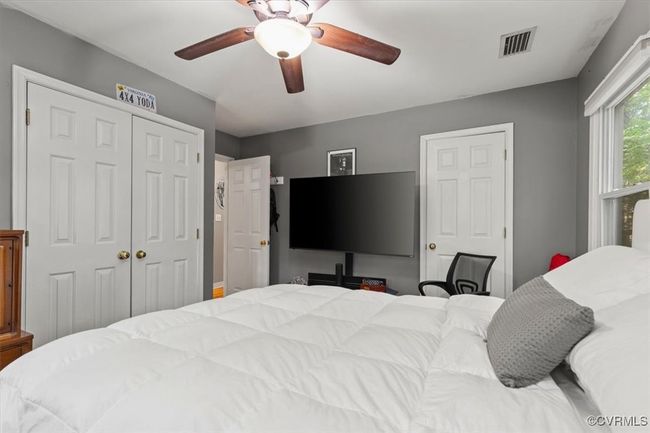 Bedroom featuring a closet and a ceiling fan | Image 23