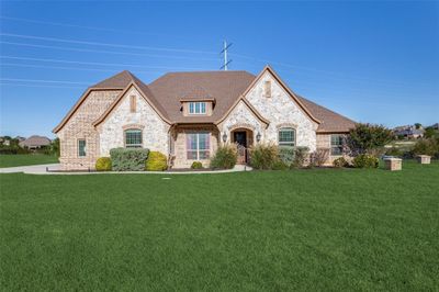 French country home with a front yard | Image 2