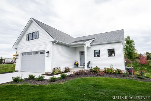 594 Sun Vale Ln, Grandville, MI, 49418-9527 | Card Image