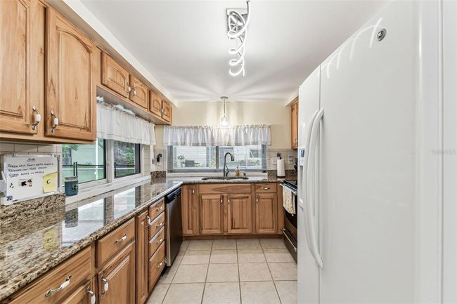 12101 Meadowbrook Ln, House other with 3 bedrooms, 2 bathrooms and null parking in Bayonet Point FL | Image 24