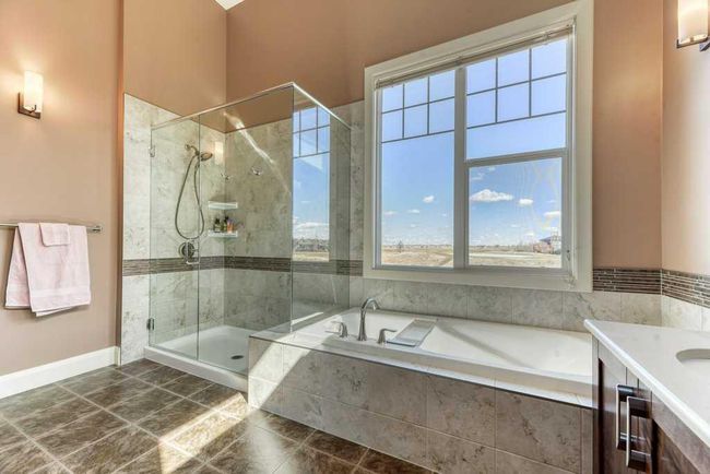 312 Boulder Creek Cres Se, House other with 3 bedrooms, 3 bathrooms and 6 parking in Langdon AB | Image 20