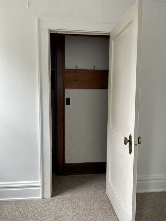 Storage closet in living room | Image 9
