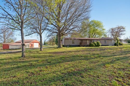 410 W 1st St, Miller, MO, 65707-9218 | Card Image