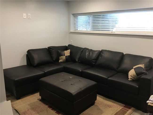 Living area featuring a healthy amount of sunlight | Image 17