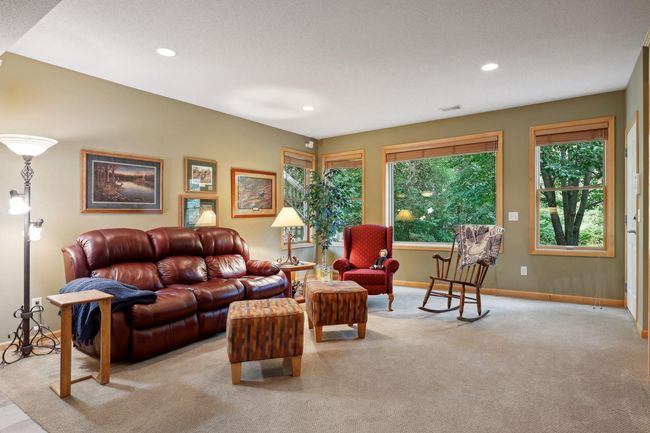 Lower level family room with gas fireplace | Image 25