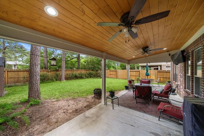 Spacious covered patio perfect for outdoor relaxation and BBQs | Image 18