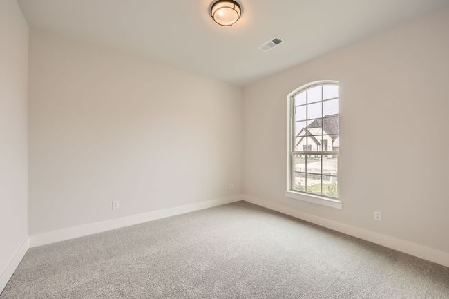 Empty room featuring baseboards, visible vents, carpet, and a healthy amount of sunlight | Image 21