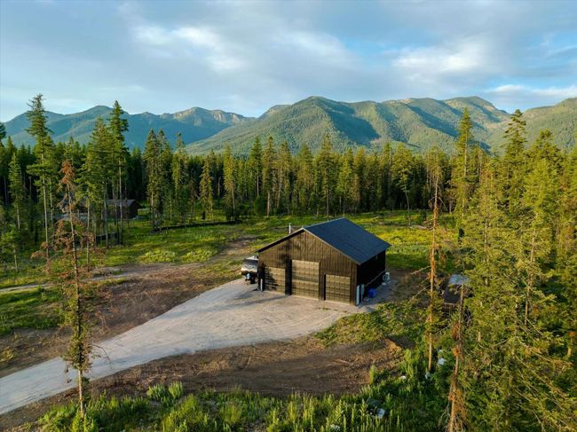 Mountain view with a heavily wooded area | Image 53