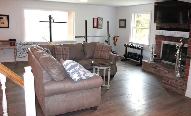 Enormous LL Game room view from staircase | Image 37