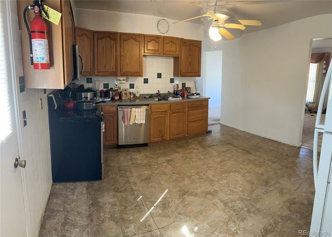 484 S Lima Cir, House other with 6 bedrooms, 3 bathrooms and 2 parking in Aurora CO | Image 5