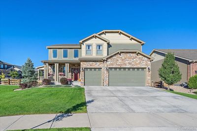 8733 Crestone Street, House other with 5 bedrooms, 4 bathrooms and 3 parking in Arvada CO | Image 1