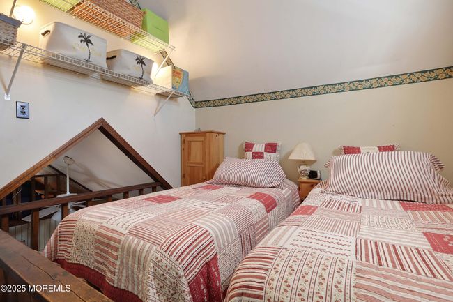 Stand-up second loft is being used as a bedroom. | Image 23
