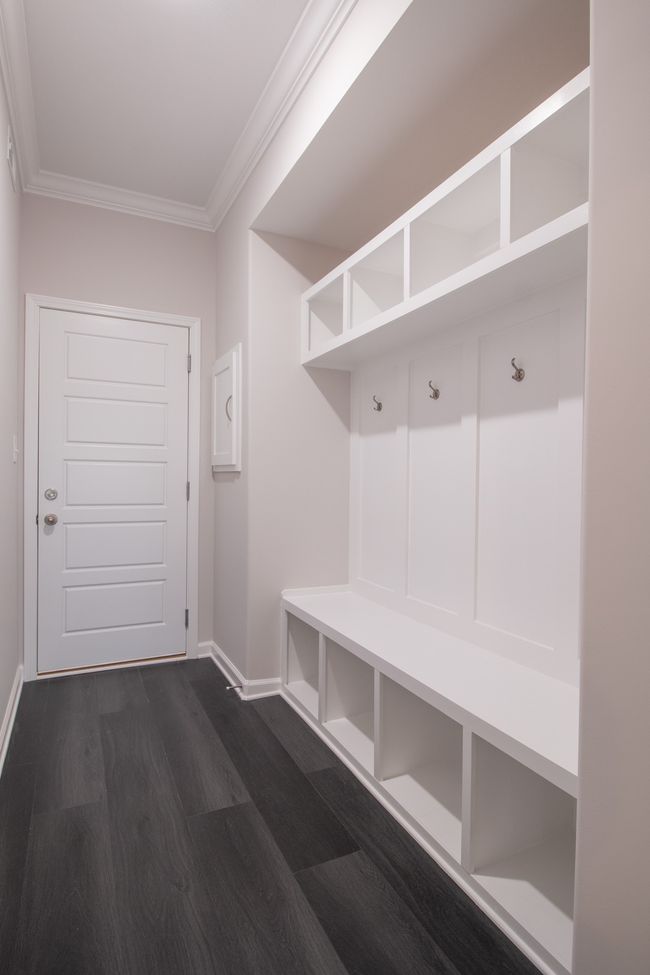 EXAMPLE>>>Off the Garage is a Mudroom w/ a Built-in Hall Tree & a Laundry Chute! | Image 20