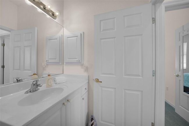 GUEST BATHROOM LOCATED ADJACENT TO THE GUEST ROOM AND FAMILY ROOM | Image 39