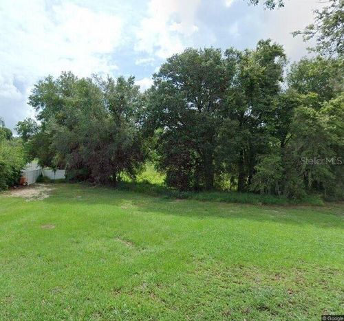 504 N Florida Ave, HOWEY IN THE HILLS, FL, 34737-3103 | Card Image