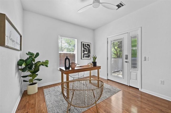 A secondary bedroom could also be used as an office or study. | Image 16