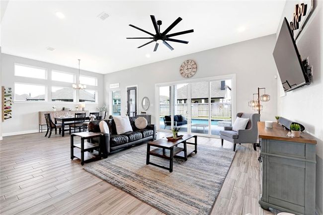 High ceilings with custom added ceiling fan | Image 19