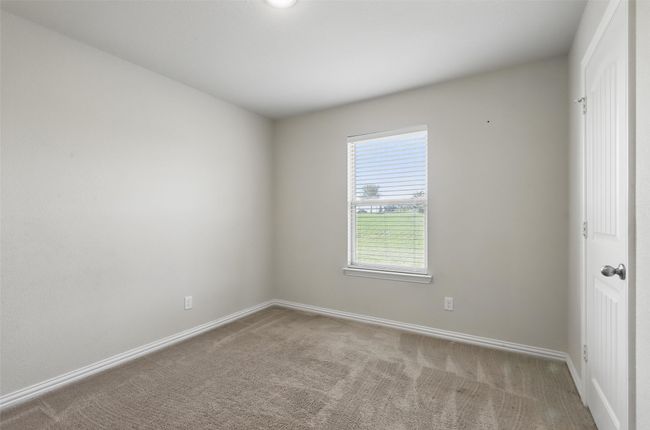 Empty room featuring carpet flooring and baseboards | Image 20