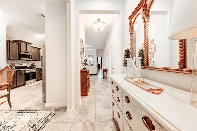Front entry way with upgraded light fixtures | Image 4