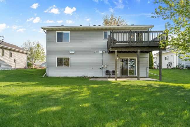 908 24th Ave NW = large deck and patio offer great views of the wetlands beyond the yard | Image 19