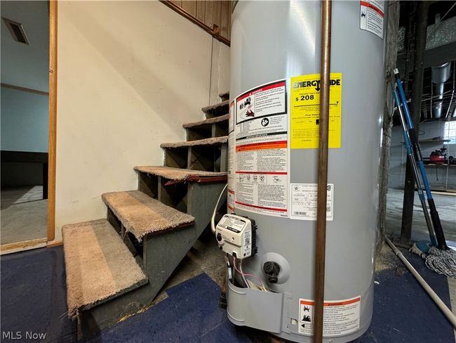 Utility room featuring water heater | Image 33