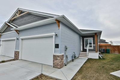 4617 26 Ave S, Home with 4 bedrooms, 2 bathrooms and 4 parking in Lethbridge AB | Image 1