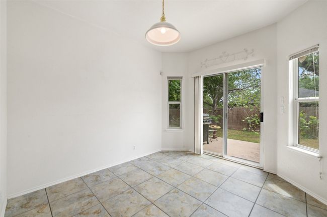 Spare room with baseboards and light tile patterned floors | Image 18
