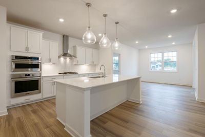 (Photo of similar home, finishes will vary) This home features an upgraded gourmet kitchen! | Image 2