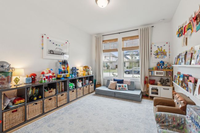 Bedroom 4 located across from Bedroom 3 - built in shelves and high end window coverings. | Image 28