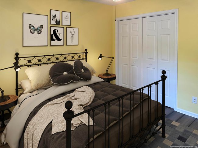 Bedroom with a closet, baseboards, and dark wood-style flooring | Image 10