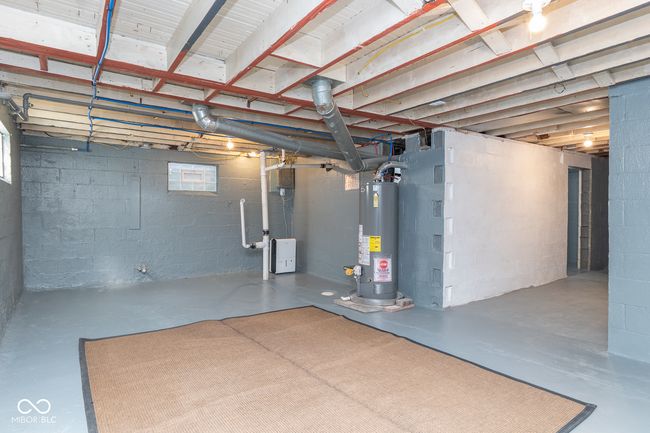 unfinished below grade area with water heater | Image 25