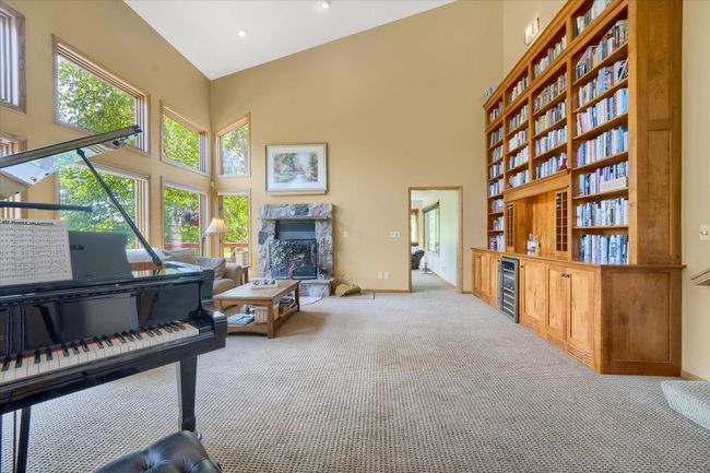 Large Bookcase And Walls Of Windows | Image 6