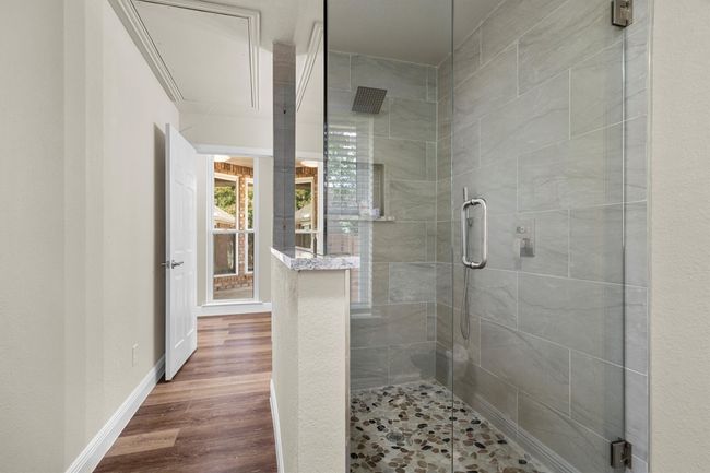 A view of the walk in shower in the third full bath. | Image 28