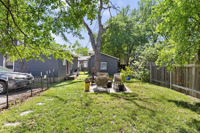 View of yard to middle property that is currently leased | Image 22