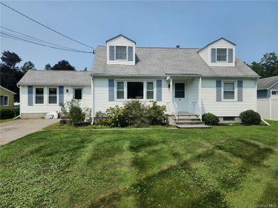 Cape Cod home that almost lives like a ranch but has a huge bonus room upstairs if needed | Image 1