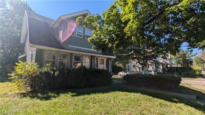 View of front of property featuring a front yard | Image 1