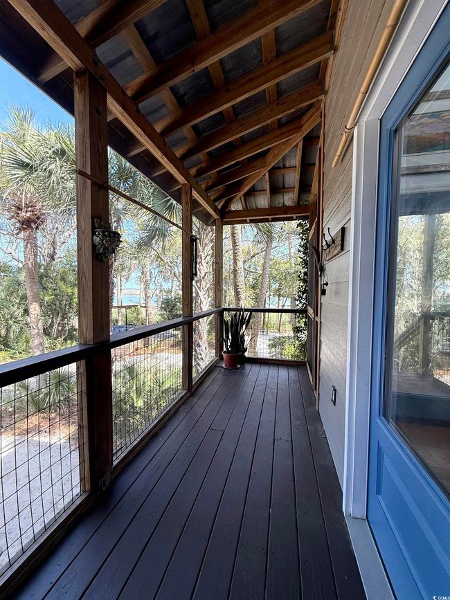 Unfurnished sunroom featuring plenty of natural light | Image 8